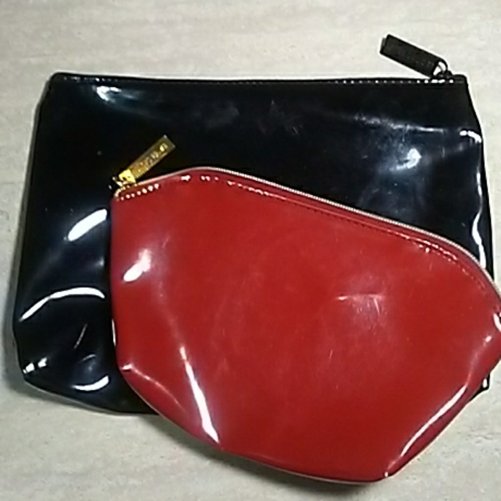 2 Estee Lauder cosmetic bags.